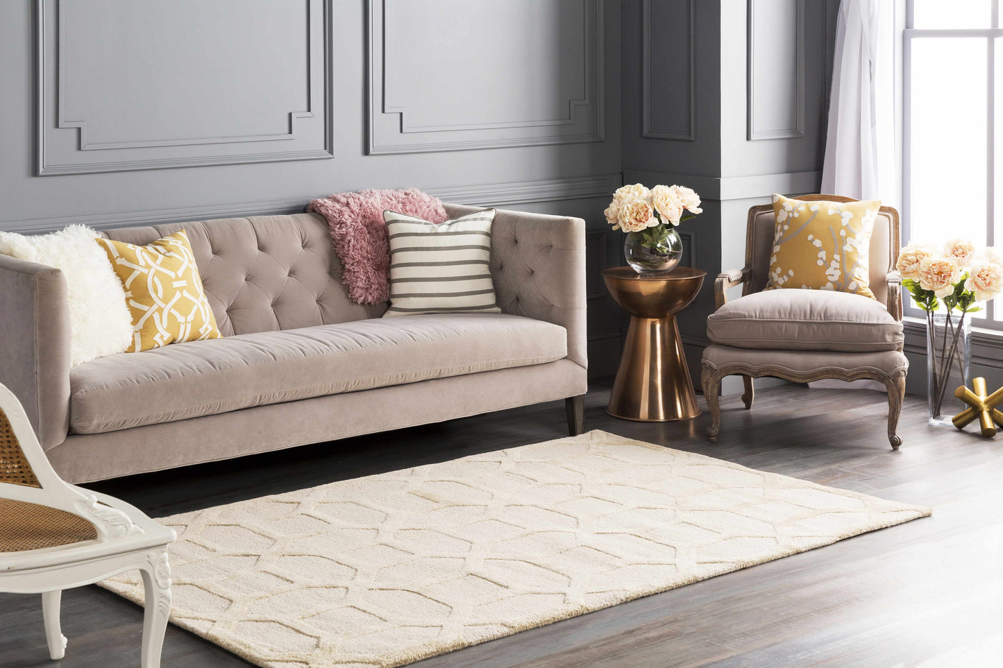 Ivory beige Dodgertown Area Rug in elegant living room setup, hand-tufted wool adds warmth and texture to contemporary decor.