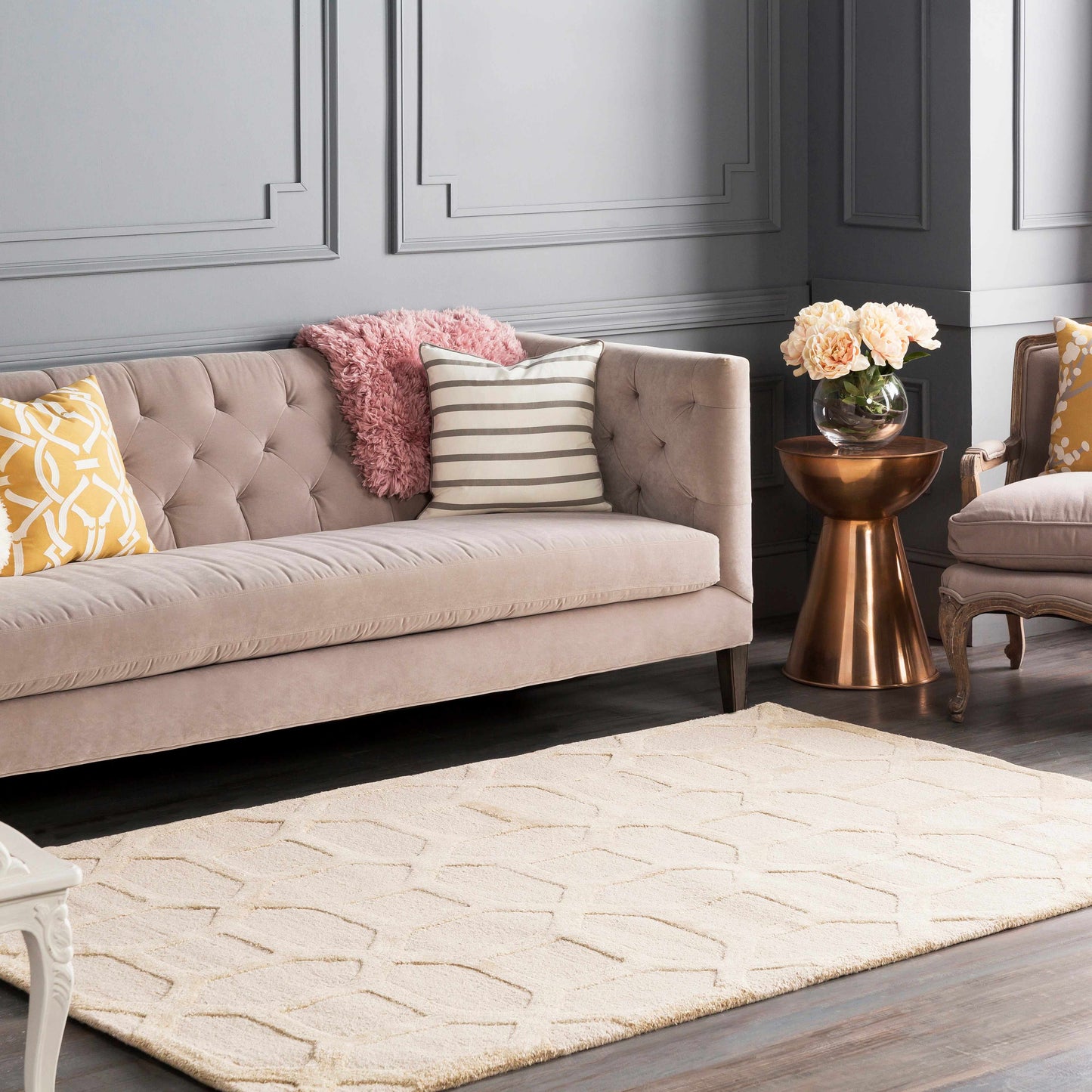 Dodgertown Area Rug styled in a modern living room, ivory beige wool with geometric texture complements neutral and gold decor.