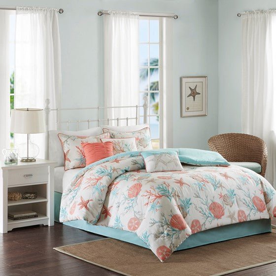 Pebble Beach cotton sateen comforter set in a coastal bedroom with coral, teal, and taupe accents