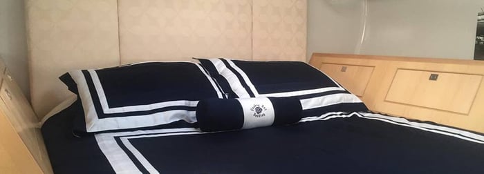 Cinching Boat Sheets VS. Custom Yacht Bedding - Quahog Bay Bedding