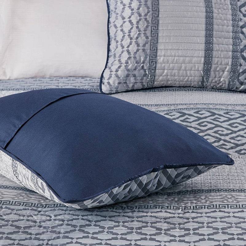 Reversible navy and patterned pillow from Universal V Berth Navy Blue Bennett Quilt Cover Set. Versatile yacht bedding for V Berth mattresses.