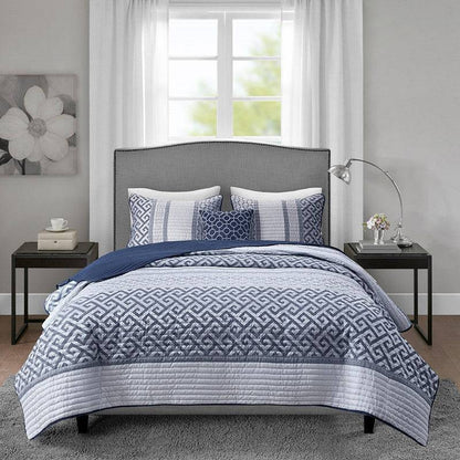 Universal V Berth Navy Blue Bennett Quilt Cover Set displayed in modern bedroom. Ideal yacht bedding with coastal grey and navy tones.