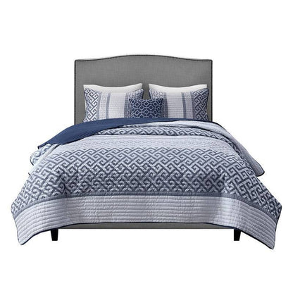 SALE! Universal V Berth Navy Blue Bennett Quilt Cover Set on bed with geometric patterns in grey and navy. Shop Yacht Bedding for stylish boat bedding.