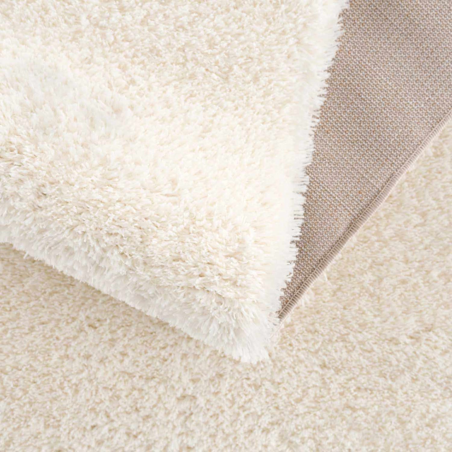 Crevalo Cream Subtle Wavy Abstract Modern Minimalist Polyester Machine Woven Area Rug - Quahog Bay Bedding