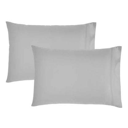 Two dusty blue pillowcases shown on a plain white background.