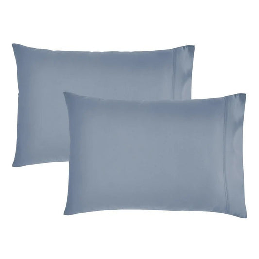 Two dusty blue pillowcases shown on a plain white background.