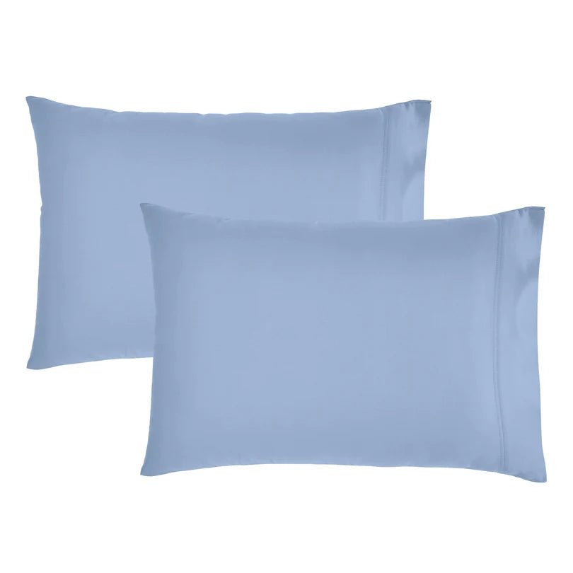 Two light blue pillowcases shown on a plain white background.