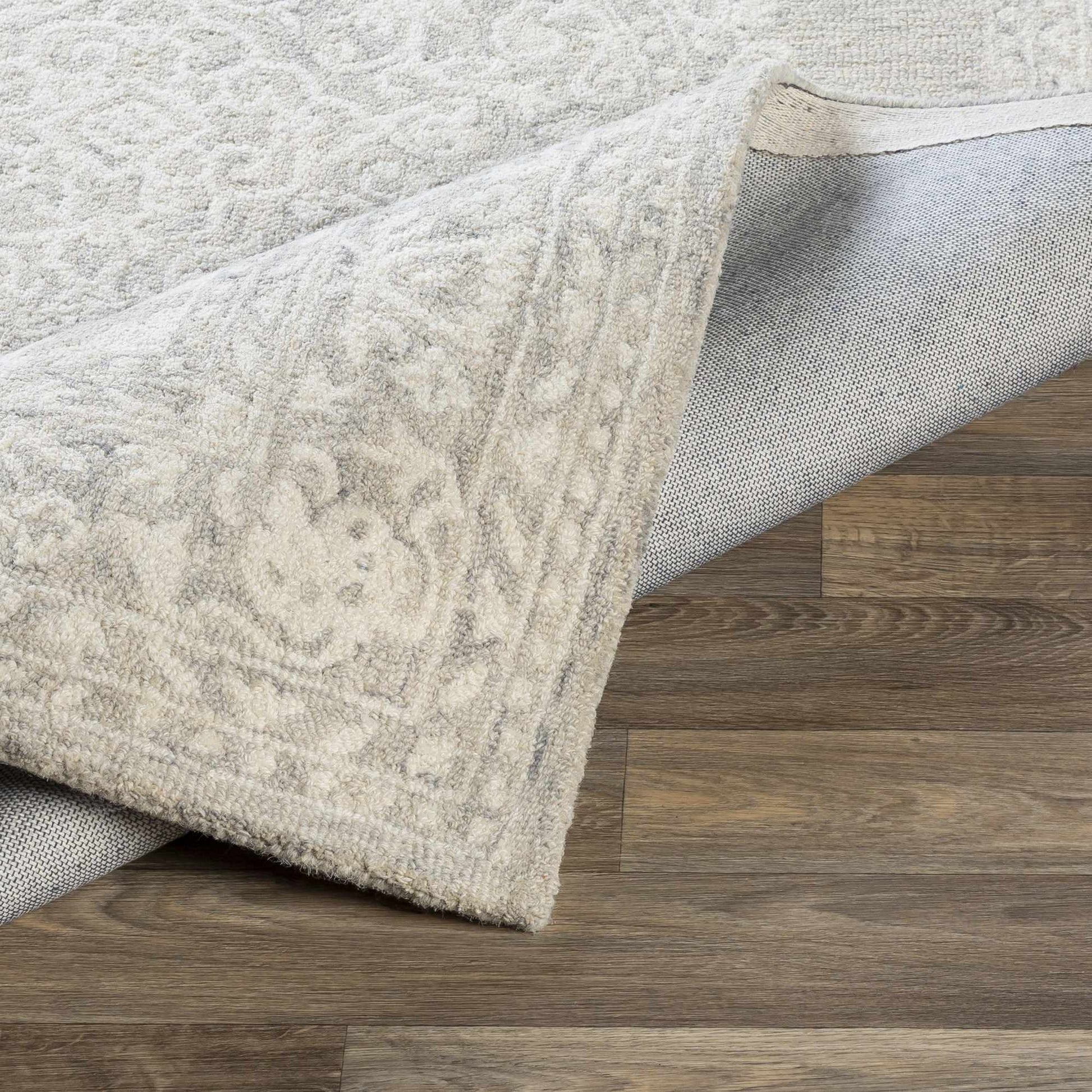 Roessleville Cream Wool Area Rug - Quahog Bay Bedding
