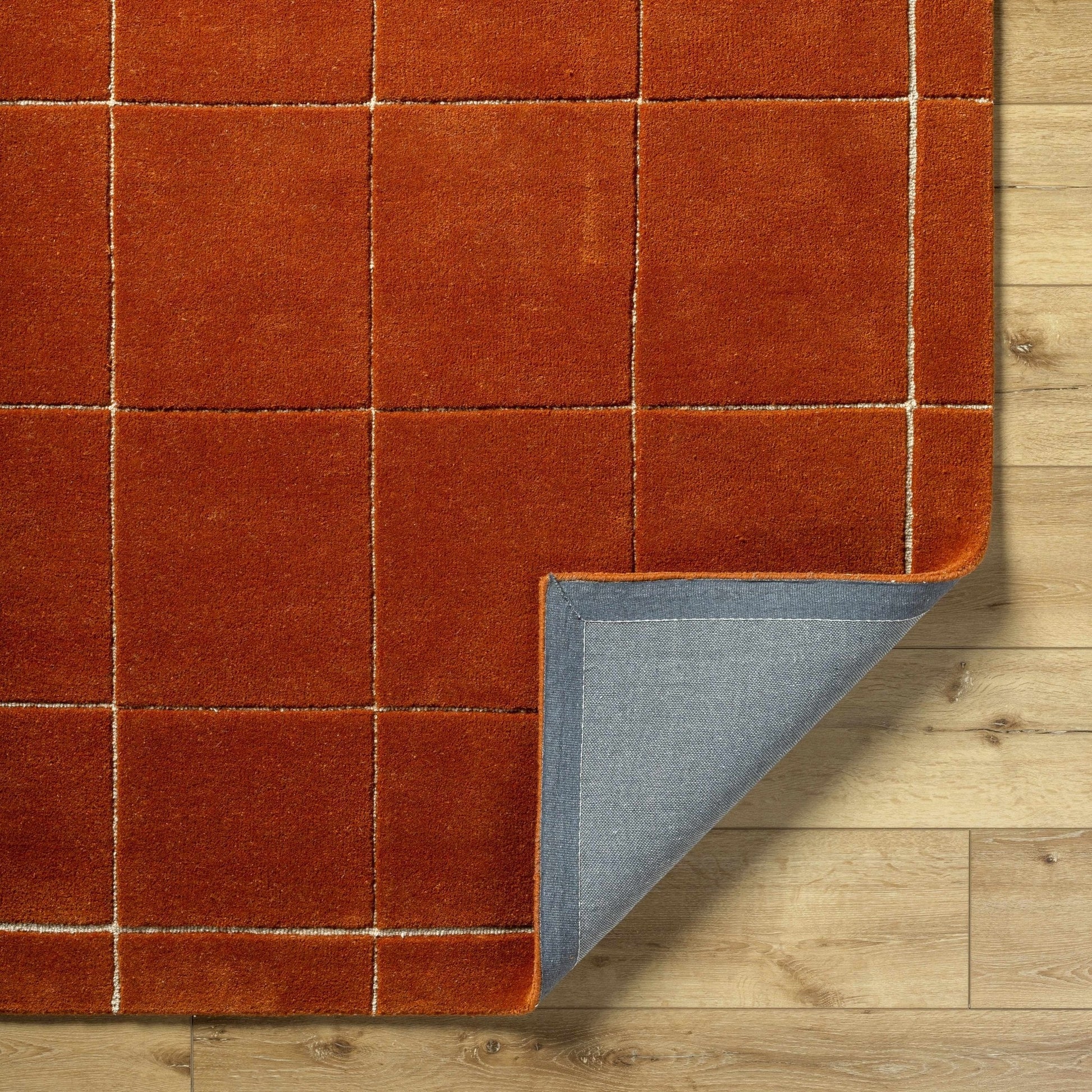 Siarl Burnt Orange Checkered Area Rug - Quahog Bay Bedding